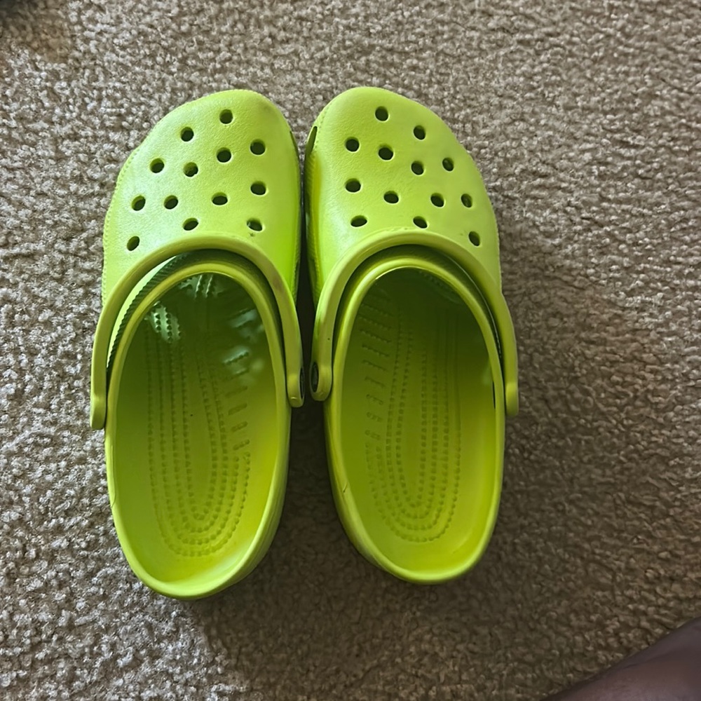 Lime  green crocs size 9 in men and size 11 in women